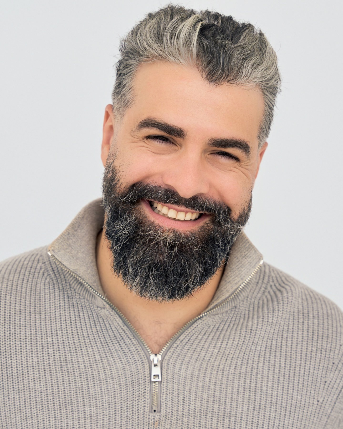 Commercial Headshot Niko Kane smiling in a commercial actor headshot